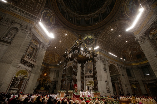 Pope Francis leads the Christmas night mass in Saint Peter's Basilica at the Vatican